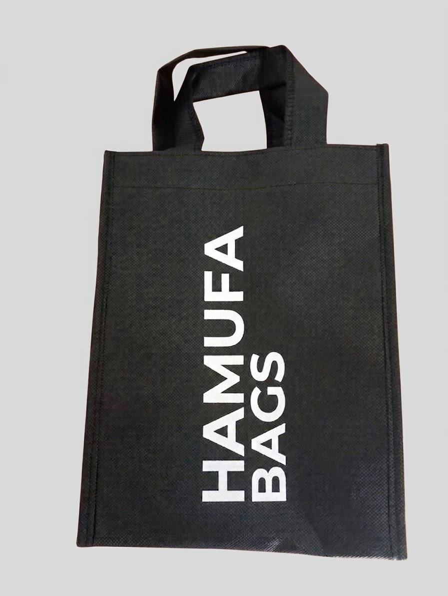 Different coloured reusable bags